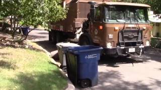 Austin Resource recovery Heil Python with and autocar Expiditor