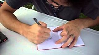 Kazu Kibuishi signing book