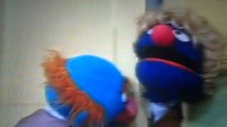 Fat Blue breaks Grovers neck