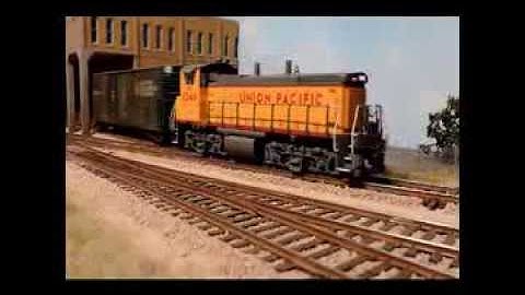 Atlas O-Scale Union Pacific MP15 with Evans Box Car