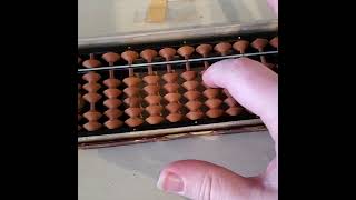 Computing sin(0.5 radians) on an abacus to 3 decimal places