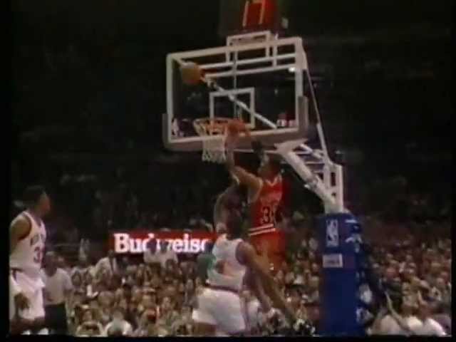 FILE – In this June 3, 1993, file photo, Chicago Bulls, Michael Jordan,  right, and New York Knicks' Patrick Ewing chase a loose ball during the  second half of game 5 of