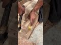 assembling joint for large wooden beams using brass cylinder and locking it into place with metal