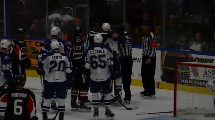 Crunch defenseman Luke Witkowski fights the Senato...