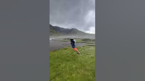Wow! Windy weather produces gusts so strong that man can fully lean forward without falling