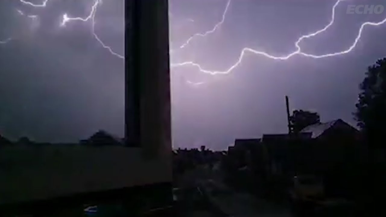 Incredible thunderstorm and lightning forks captured on camera over Merseyside sky