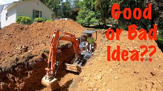 Digging deep trench with mini excavator