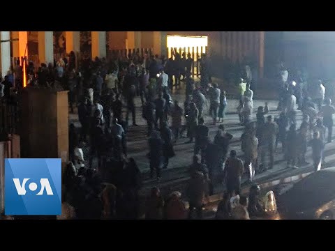 Crowds Gather Outside University After Clashes Between Students and Security Forces in Tehran.