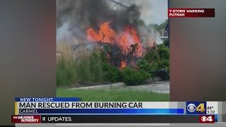 Man rescued from car by off-duty Carmel Police officer and a Marine seconds before it caught fire