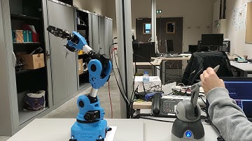 Niryo robotic arm control with a haptic geomagic touch