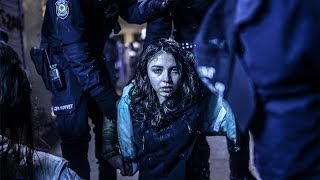 Photos of the Day - Riot Police Injure Young Girl