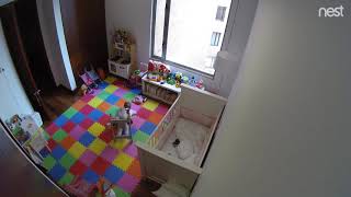 Girl plays in rocking horse and faceplants (Security camera)