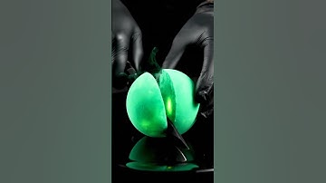 Cutting a emerald mist sphere with surreal precision #ai #asmr #abstract