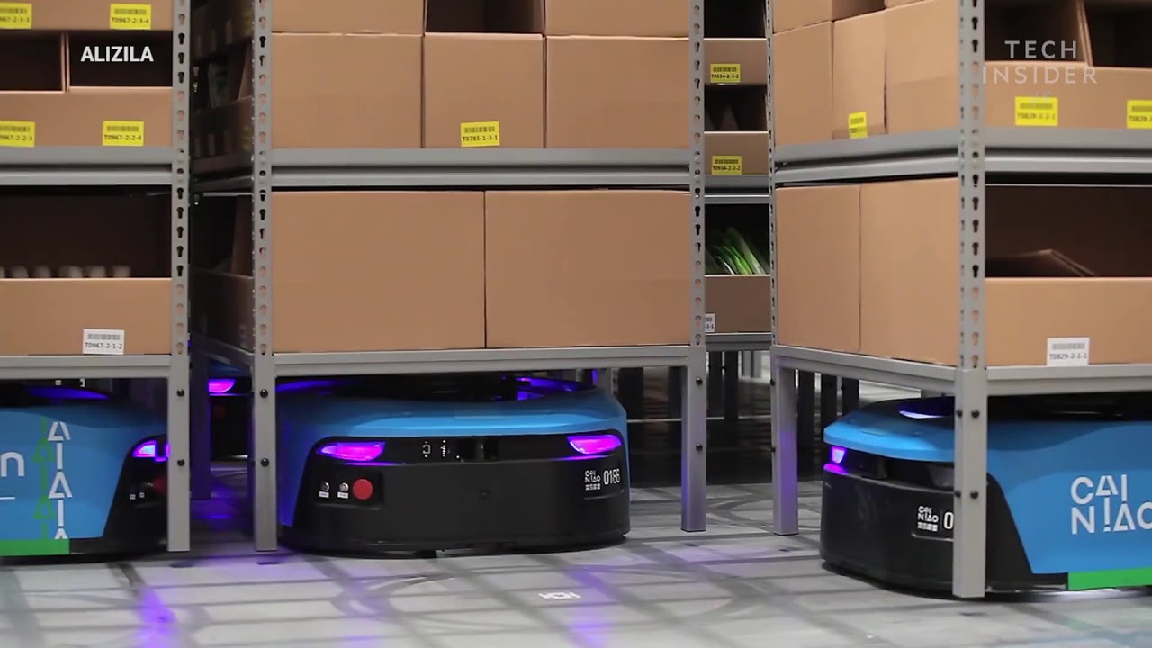 Alibaba warehouse staffed by robots - YouTube
