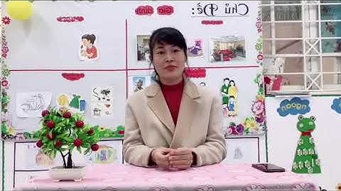 Dạy trẻ cài, cởi cúc áo.