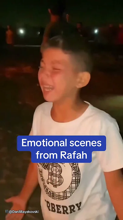 Heartbreaking moment boy breaks down in tears as fire rages in Rafah
