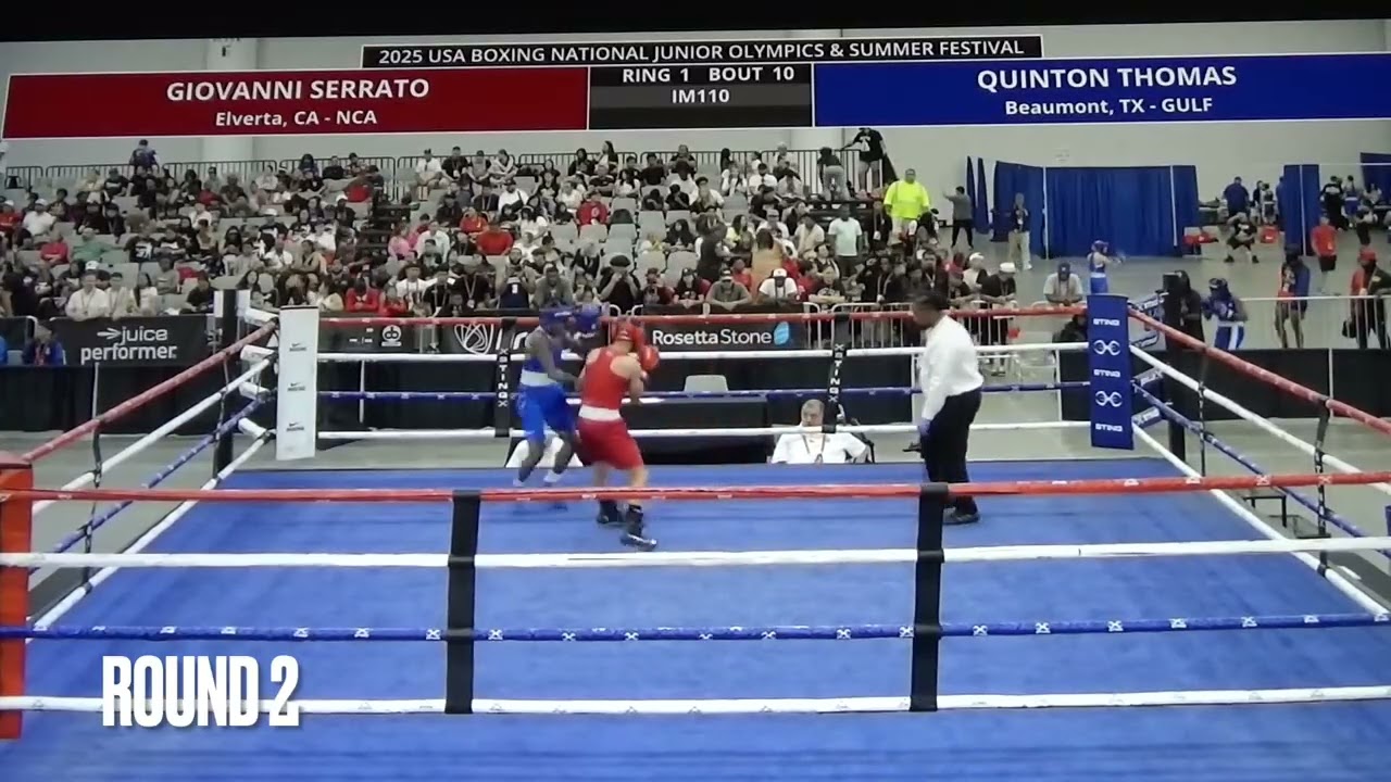 Quinton Thomas (Blue) wins a National Championship at the JR Olympics in LV versus Giovanni Serrato