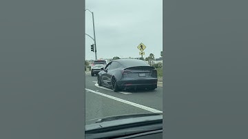 Tesla model 3 dual motor with body kit.