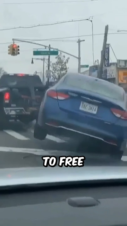 Driver Escapes From Tow Truck