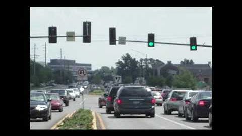 Driving through intersections with flashing left-turn arrows