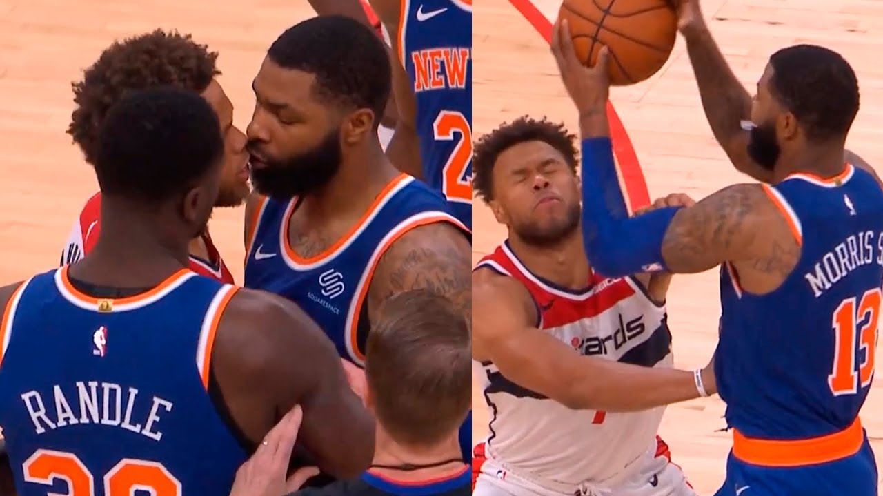 Miami Heat forward Markieff Morris, left, shakes hands with his twin  brother Los Angeles Clippers forward Marcus Morris Sr., right, before Game  1 of a NBA basketball Eastern Conference finals playoff series