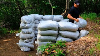 I'm building a hut out of sacks in a wild place.