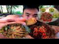 Eating green tamarind with spicy chili  lemon mouth watering boy tapang