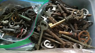 Selling the gold watch looking Through antique keys Getting ready for the flea market blue Bus Dave