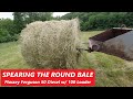 Spearing The Round Bale - Massey Ferguson Model 50 Diesel &amp; 100 Loader