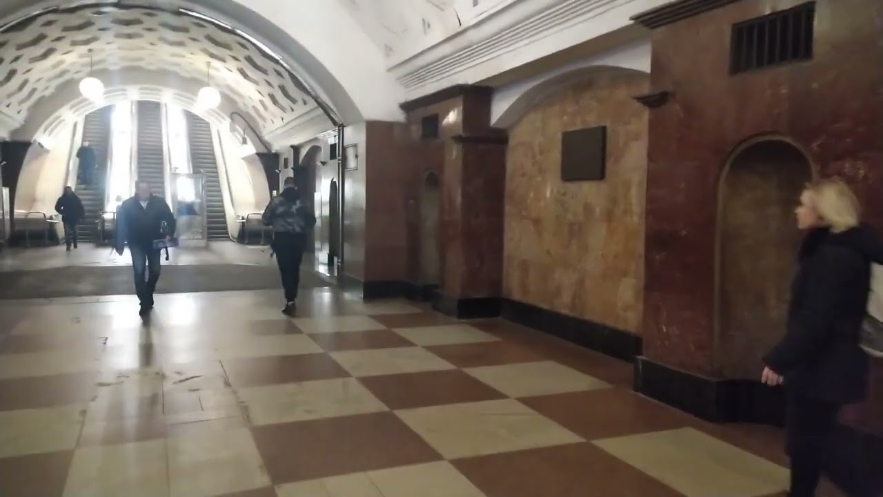 Krasnye Vorota metro station, Moscow, Red Line - interior view, passengers, arrival of the train