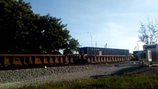 FEC 222-21 with a short Intermodal and Racks