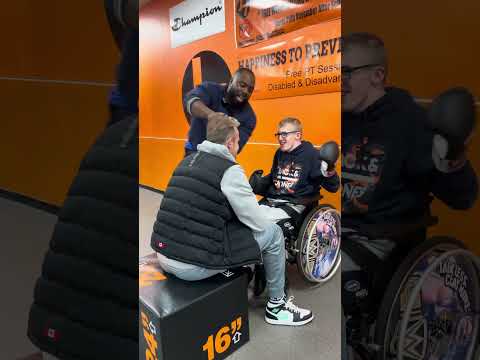 Boy with cerebral palsy in a #wheelchair punches his #daddy