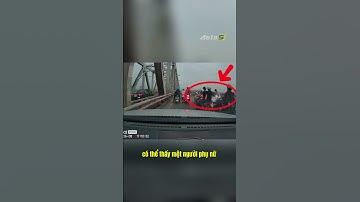 Nữ tài xế dừng xe trên cầu Chương Dương, thản nhiên vứt rác xuống sông Hồng 😅