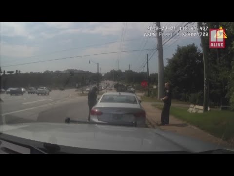 Dash camera video of Dunwoody Police officer being dragged on I-285