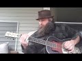 Chubba plays some groovy blues on porch