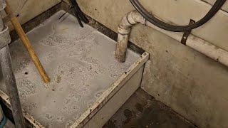 unclog drain line to slop sink