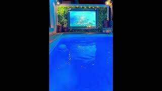 Tv by the pool at Nisi Luxury Suites and Villas