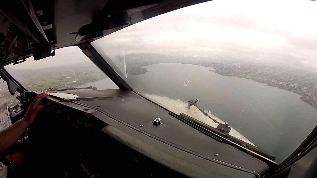 Rainy approach and landing in Geneva, Switzerland - Boeing 737 cockpit view