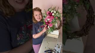 I made a Spring Wreath using the thin grapevine wreath with spray foam added as a base! 🌿🌺🌿