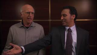 larry david gets in trouble with a guy on the elevator - 