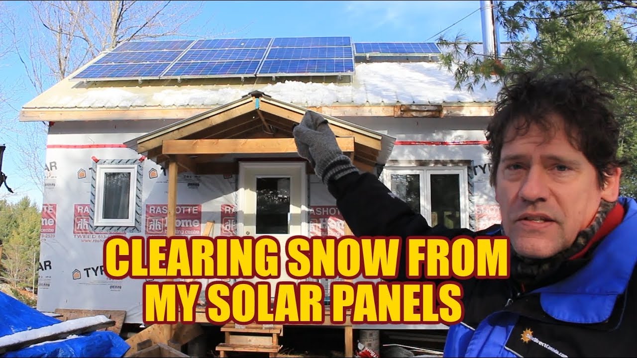 Off Grid Cabin in the woods - Clearing snow from my solar panels - YouTube