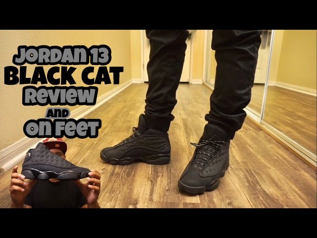 jordan 13 black cat on feet