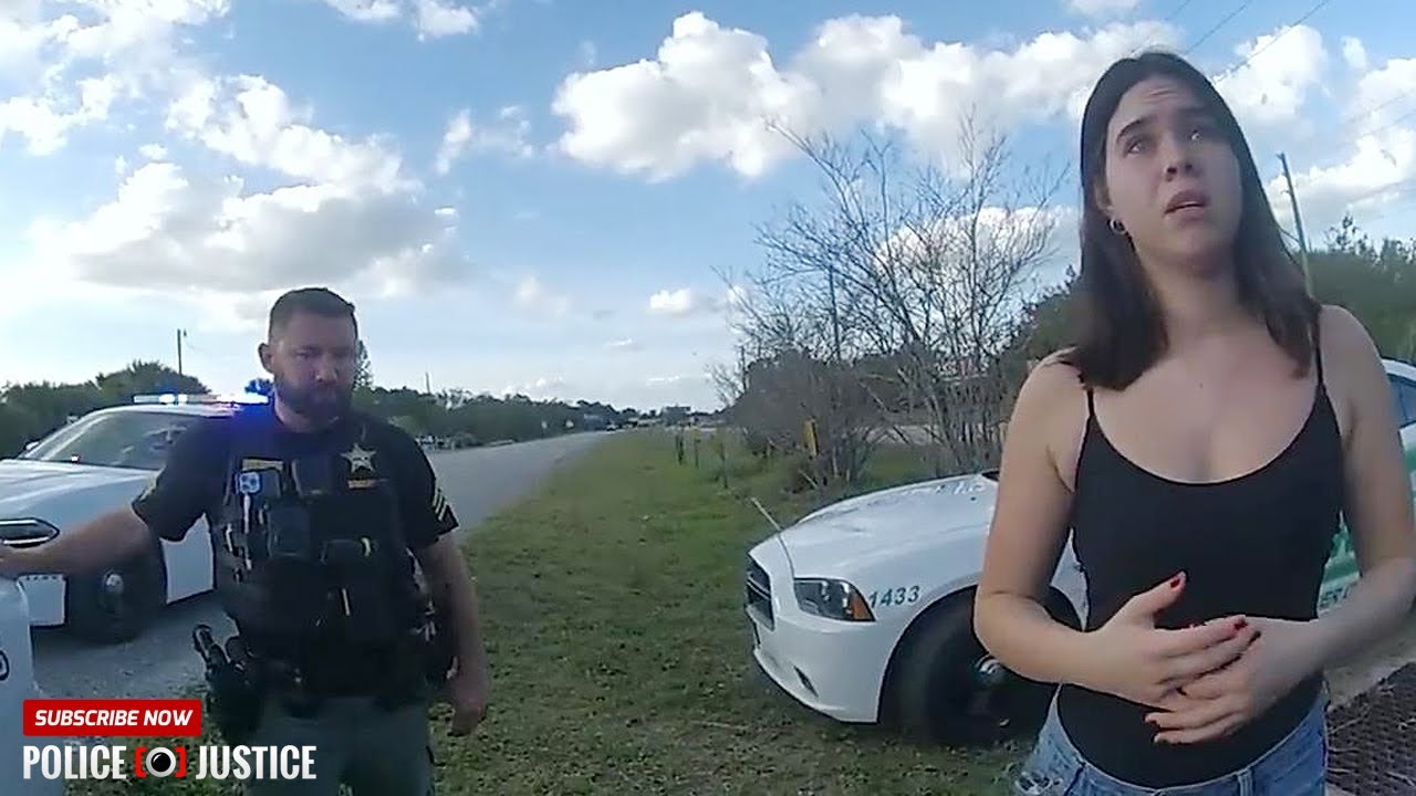 Traffic Stop Turns Chaotic: Driver Refuses to Exit Car and Threatens Officer