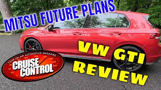 MITSU  PLANS, GM PLUGS IN, MUSTANG BRAND, VW GTI REVIEW