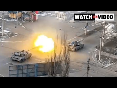 Tanks fire in streets of Mariupol, Ukraine