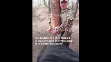 Russian troops handcuffed to trees after defying orders to advance into Ukraine