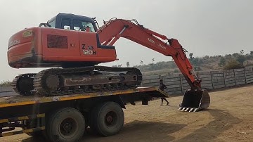 Excavator TATA Hitachi poclain Unloading by professional operator