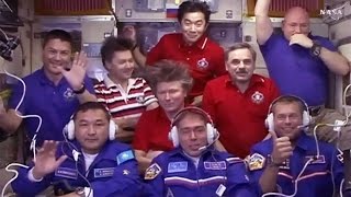 Soyuz TMA-18M crew opens hatch to the International Space Station