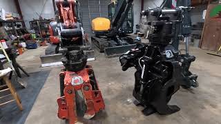 Hyundai and Kubota mini excavators and Rotobec grapples side by side