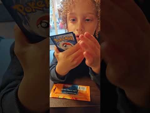 Opening a pokemon card pack we got from the arcade #pokemon #cards #arcade #round1